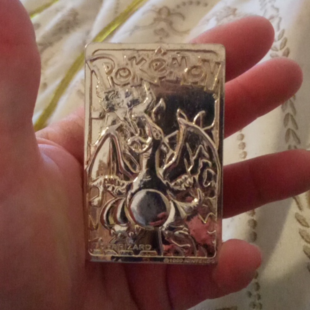 Gold plated Pokémon card Charizard 1999 Nintendo $500/obo